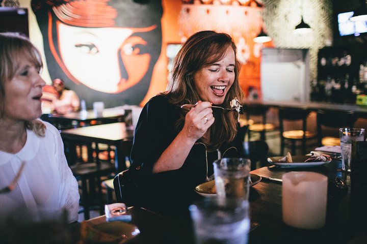 a group of people sitting at a table