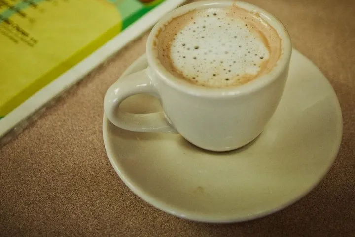 a cup of coffee on a table