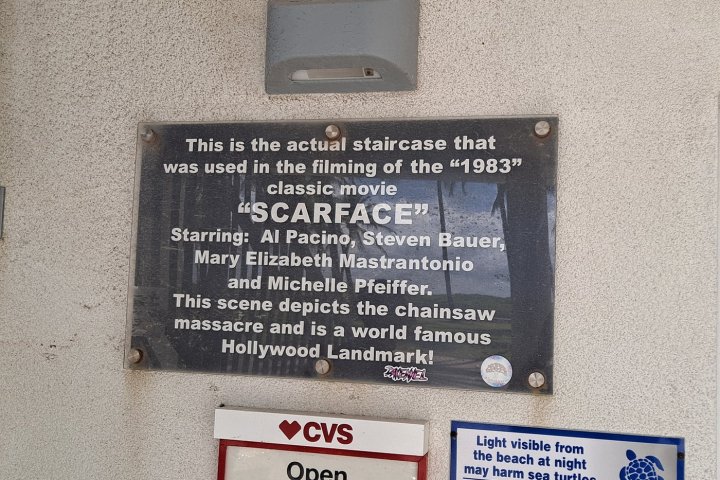 a plaque on the side of a building