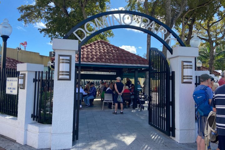 a group of people standing in front of a building