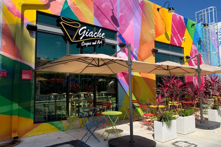 a colorful kite sitting on top of a building